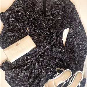 Adorable Navy Romper with Polka Dots